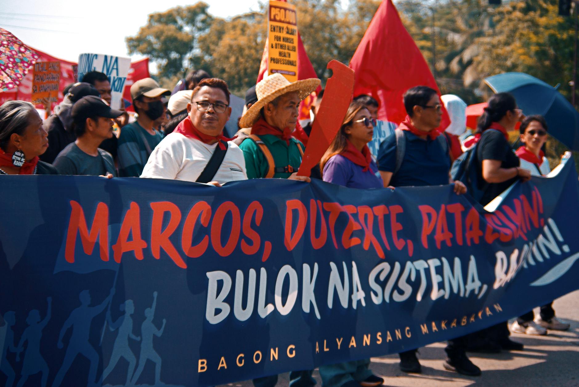 Editorial image for LOOK: Supporters of former President Rodrigo Duterte pose for a picture with a mascot ... - Facebook