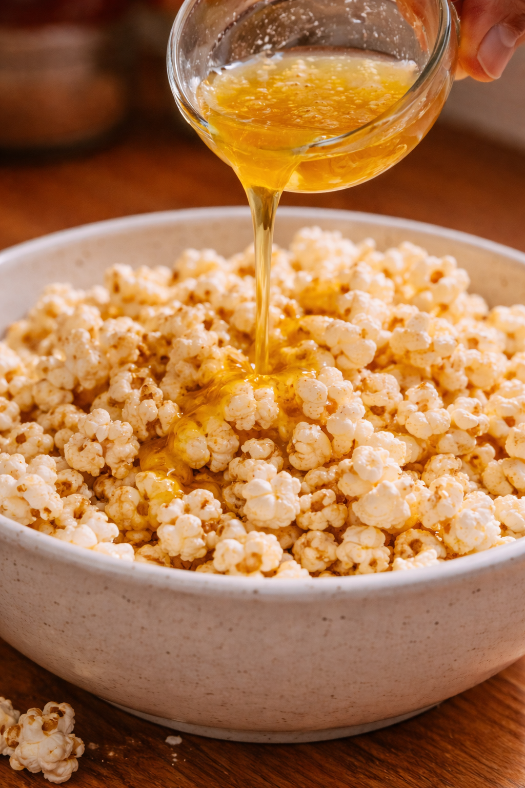 Alt text: Finished cannabis popcorn in a bowl with even coating and light seasoning