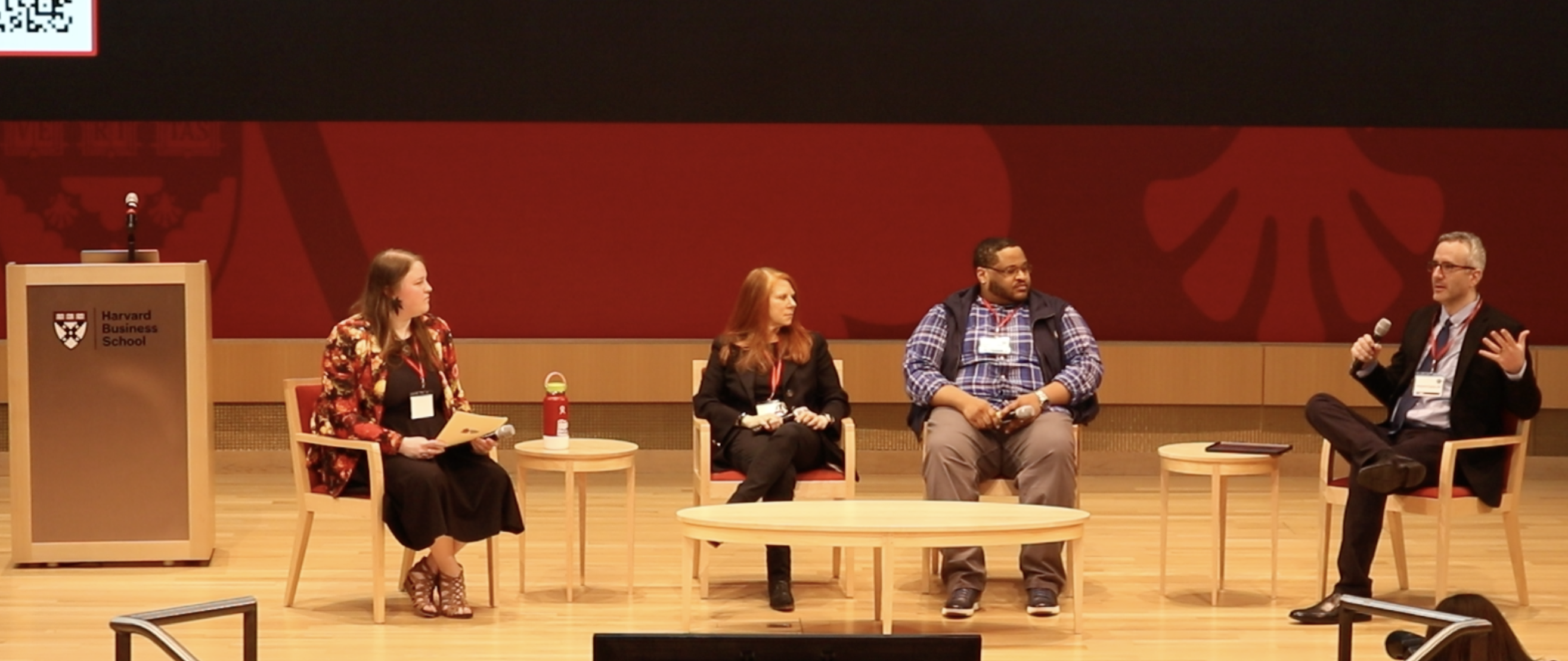 Dr. Benjamin Caplan, MD 3 Dr. Benjamin Caplan participating in a panel discussion at Harvard Business School