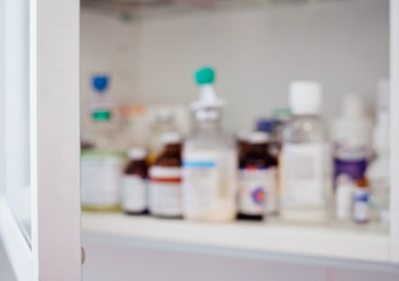 white and red labeled bottles