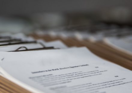 restaurant menus on clipboards close up