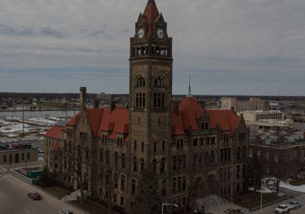 a large building with a clock on the top of it