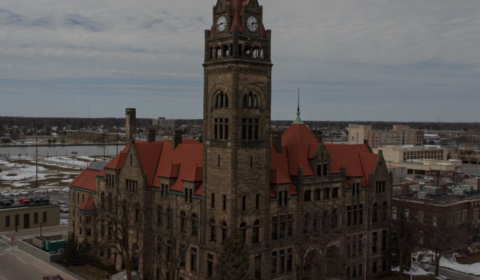 a large building with a clock on the top of it