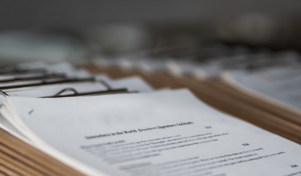 restaurant menus on clipboards close up